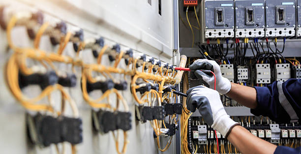 Professional Electrician technician working in Butler Beach, FL